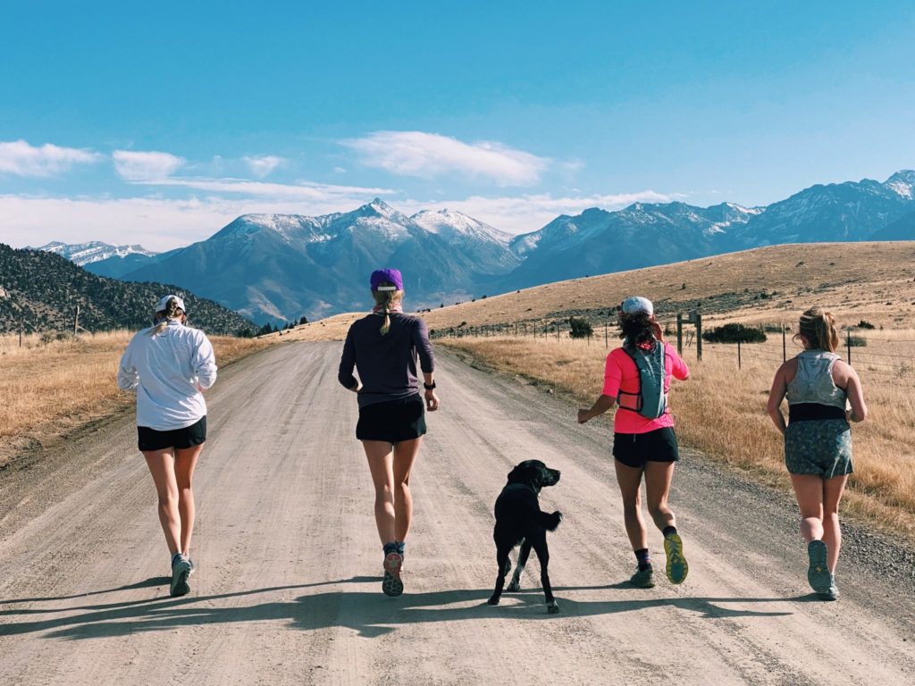 Jogging people with dog