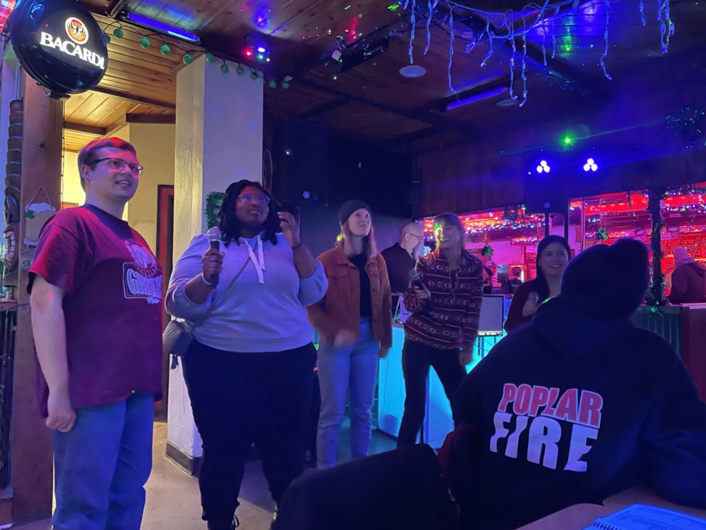 AmeriCorps members singing karaoke